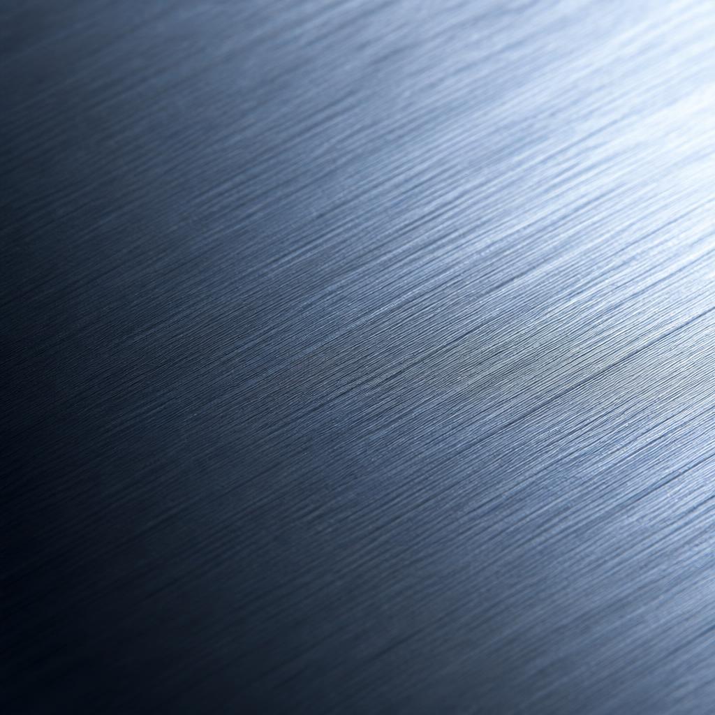 Macro close-up of the brushed titanium surface grain
